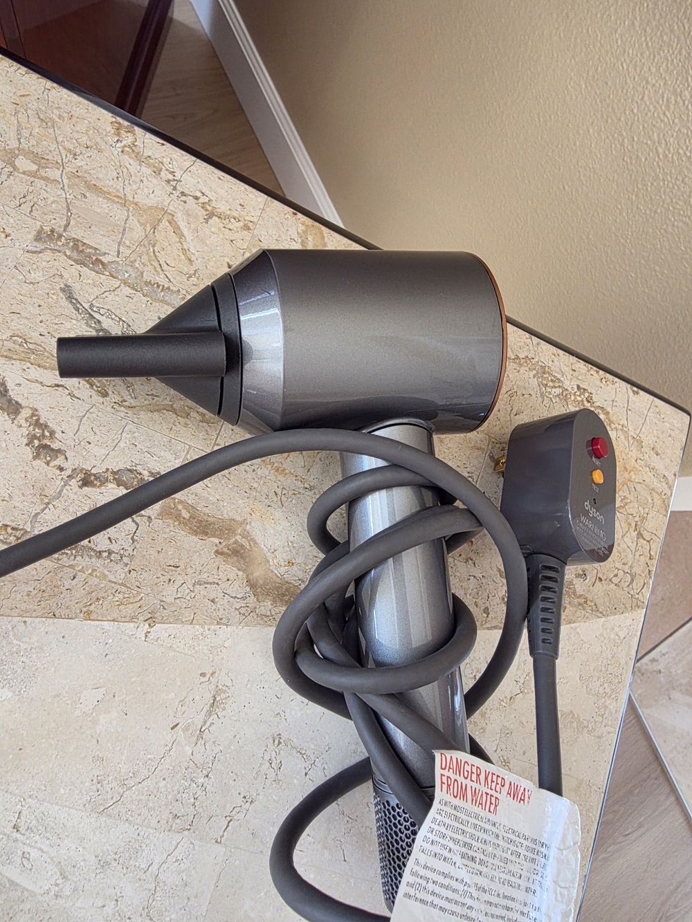 Sleek Gray Hair Dryer with Concentrator Nozzle